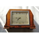 CLOCKS - An Art Deco oak cased mantle clock, for r