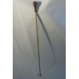 COLLECTABLES - An antique walking stick/ cane, bel