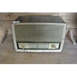 COLLECTABLES - A vintage Bakelite table top radio,