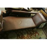 FURNITURE/ HOME - An antique chaise lounge in brow