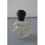 SILVER - A small cut glass dressing table bottle w