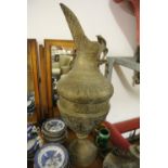 COLLECTABLES - A large Indian brass jug with decor