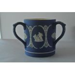 CERAMICS - A Wedgwood blue jasper ware tri handle