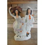 CERAMICS - An antique ceramic Staffordshire figure