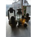 COLLECTABLES - A collection of various oil lamps,