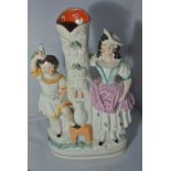 CERAMICS - A small Staffordshire spill vase in the