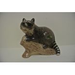 CERAMICS - A scarce Beswick Raccoon on branch, wit