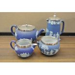 CERAMICS - A 4 piece Wedgwood blue jasper ware bac