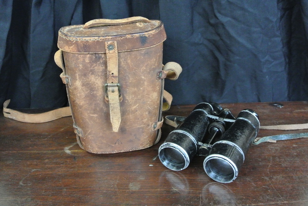 MILITARIA - A pair of binoculars in original case,