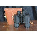 COLLECTABLES - A cased set of vintage binoculars.