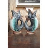 CERAMICS - A pair of antique ceramic Glug jugs (1