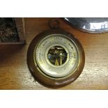 COLLECTABLES - A small vintage oak cased aneroid b