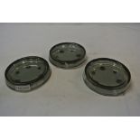 COLLECTABLES - A set of 3 glass ashtrays advertisi
