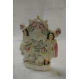 CERAMICS - An antique Staffordshire figure showing