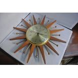 CLOCKS - A vintage/ Mid Century Paico Sunburst qua