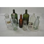 COLLECTABLES - A collection of various glass bottl