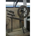 COLLECTABLES - An antique spinning wheel.