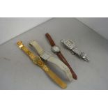 WATCHES - A collection of 4 wristwatches.