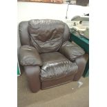 FURNITURE/ HOME - A brown leather recliner armchai