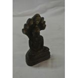COLLECTABLES - A small brass Buddha figure.