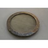 SILVER - An antique circular photograph frame, ful