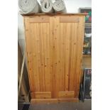 FURNITURE/ HOME - A large pine wardrobe.