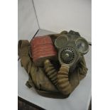 MILITARIA - A British Military gas mask with origi