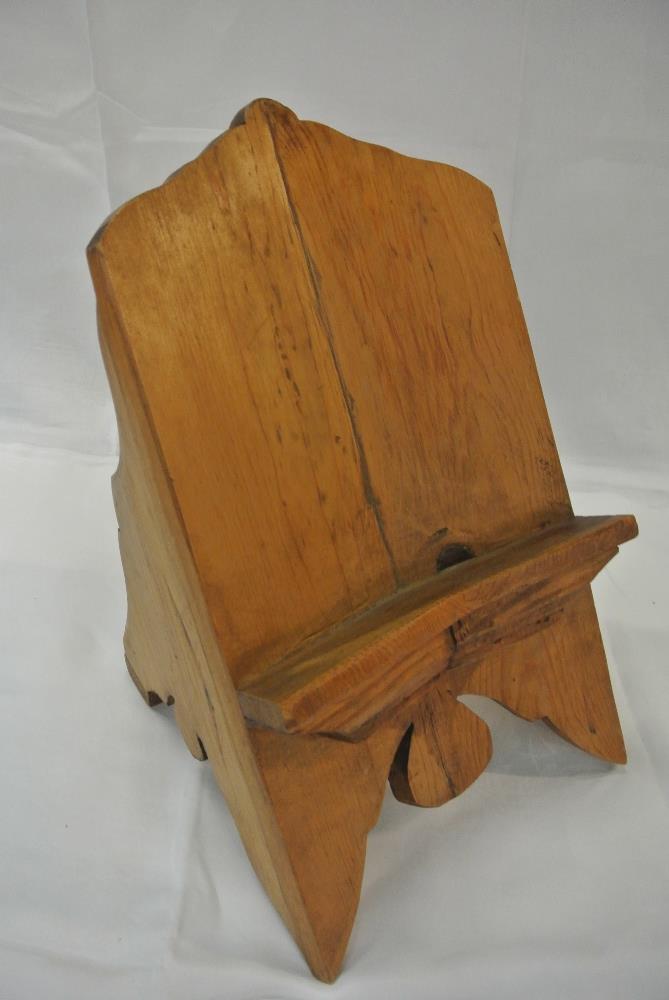 COLLECTABLES A Mexican pine book rest.