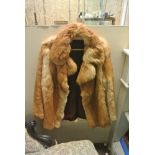 COLLECTABLES - A vintage light brown fur coat.