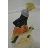 CERAMICS - An Art Deco style ceramic figure of a L