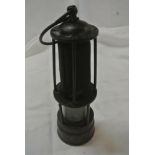 COLLECTABLES - An antique miners lamp with no visi