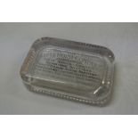 COLLECTABLES - An antique advertising paperweight,