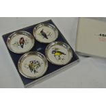 COLLECTABLES - A set of 4 silver plated dishes wit
