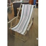 COLLECTABLES - A vintage wooden deck chair.