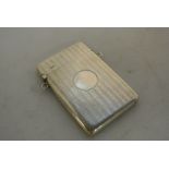 SILVER - An antique sterling silver card case with