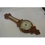 COLLECTABLES - An antique banjo aneroid barometer