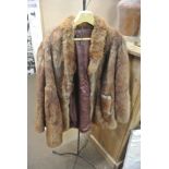 COLLECTABLES - A vintage fur coat.