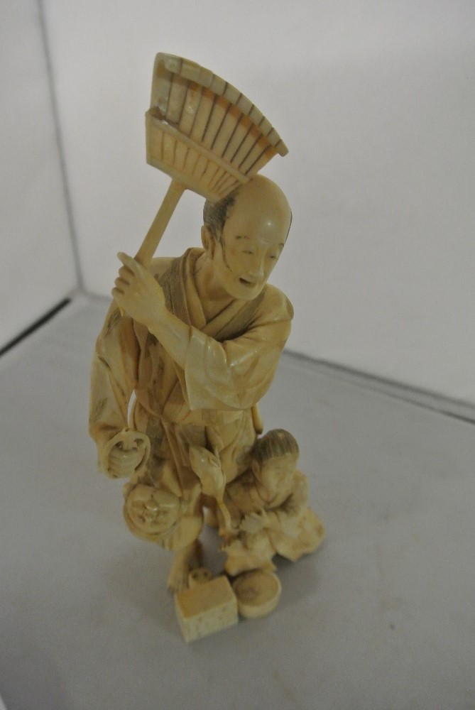 COLLECTABLES - An antique/ Meiji period carved ivo
