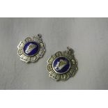 SILVER - A pair of Irish silver fob/ medals with e