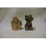 COLLECTABLES - A collection of 2 carved stone figu