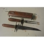 COLLECTABLES - An unusual vintage carving set in t