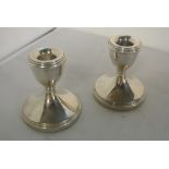 SILVER - A pair of sterling silver candlestick wit