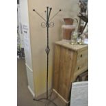 FURNITURE/ HOME - A wrought iron coat stand.