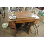 COLLECTABLES - An antique Singer sewing machine wi