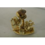 COLLECTABLES - A small antique Oriental carved ivo