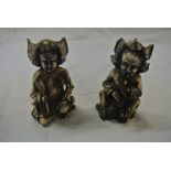 COLLECTABLES - A pair of antique style resin figur