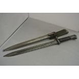 MILITARIA - A vintage WW2 era bayonet in original