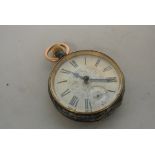 WATCHES - A large antique pocket watch with engrav