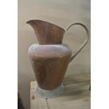 COLLECTABLES - A large vintage copper jug, measuri