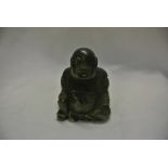 COLLECTABLES - An antique jade laughing Buddha fig